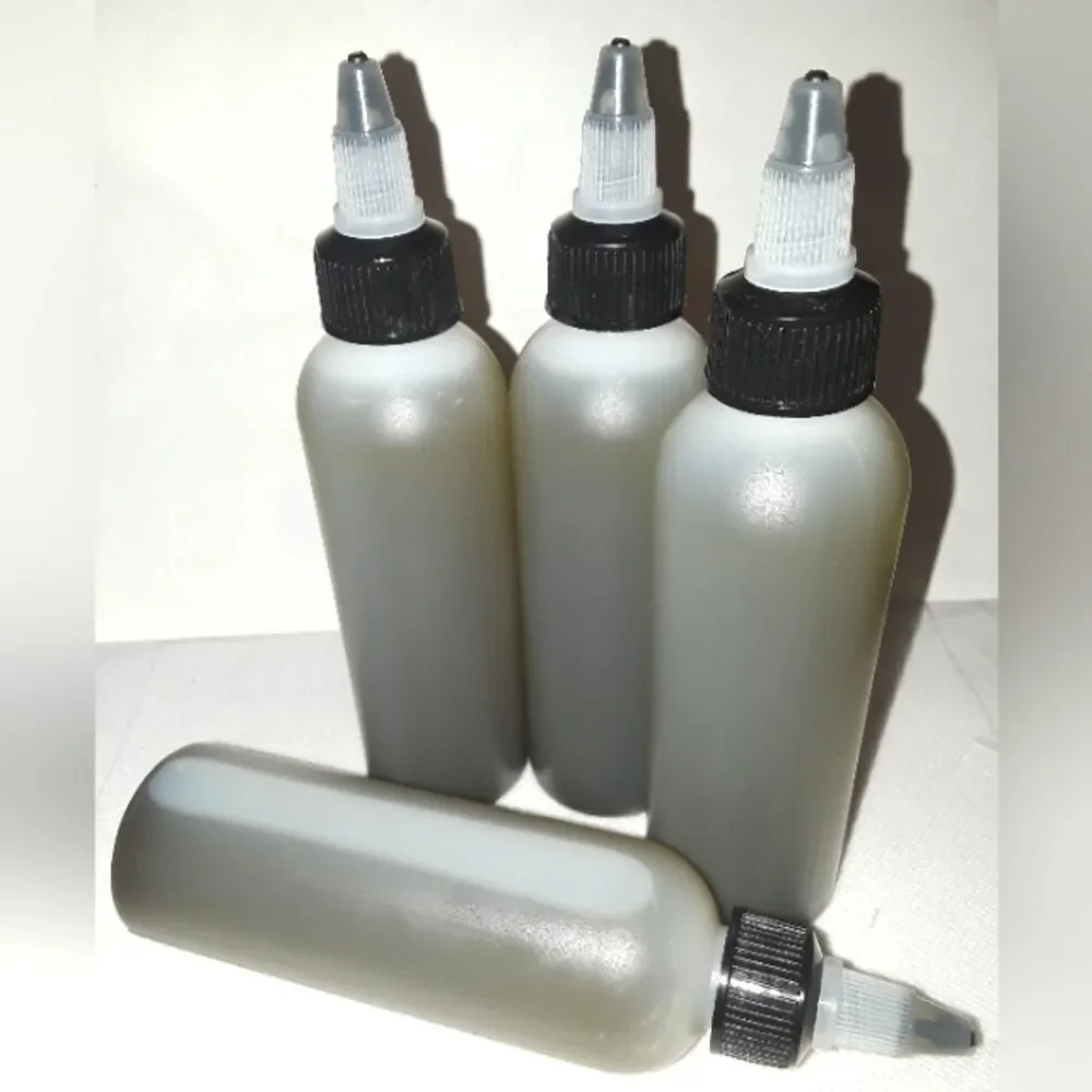 HAND crafted Neem and Amla hair and body oil